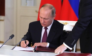 Putin semneaza
